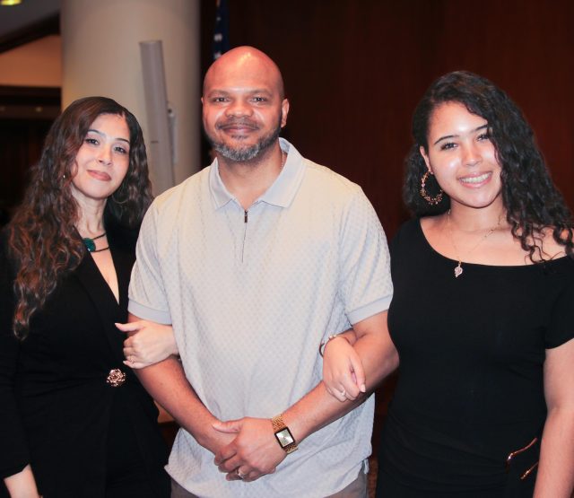 Panelist Kevin Richardson poses with his family before the event.